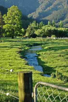Ideal home hydropower with stream in paddock - iStock Photo 